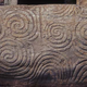 The triple spirals on the entry stone at Newgrange